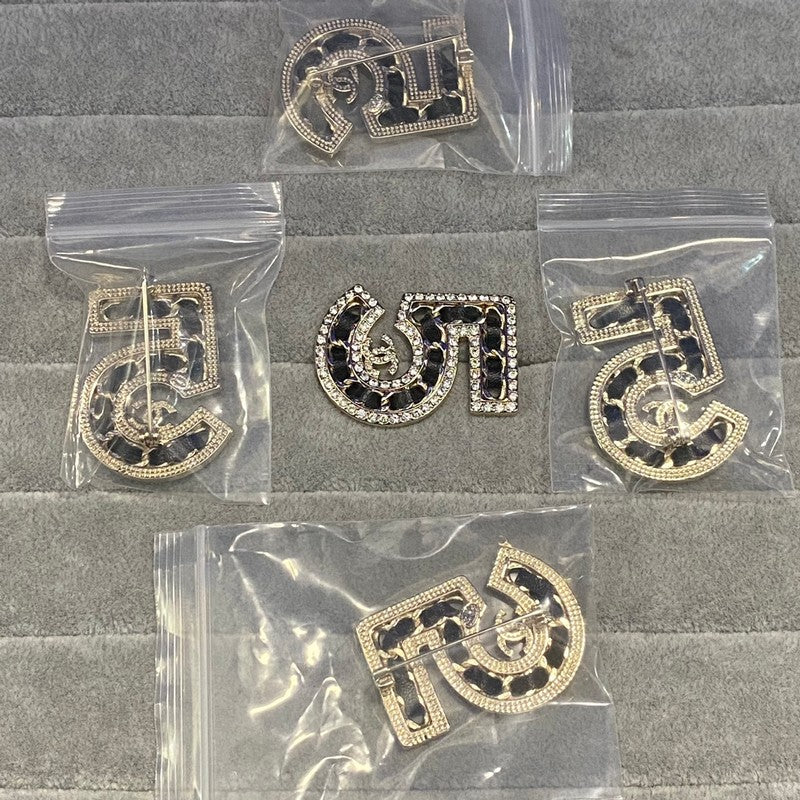 CC NO.5 Black Leather Diamond Brooch