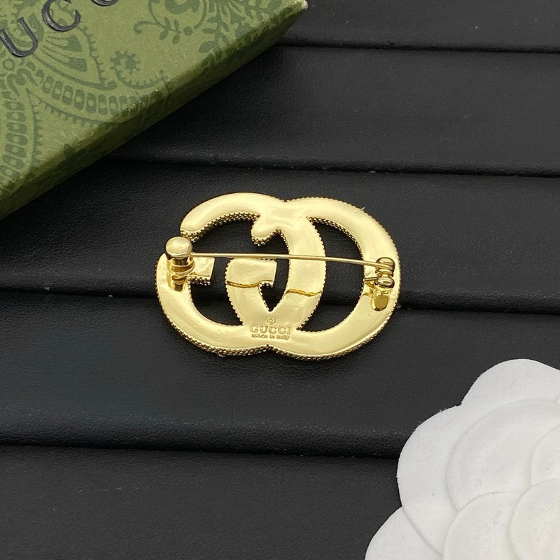 GG Diamond Gold Brooch