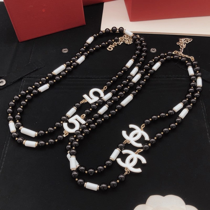 CC White Logo Long Black Pearl Necklace