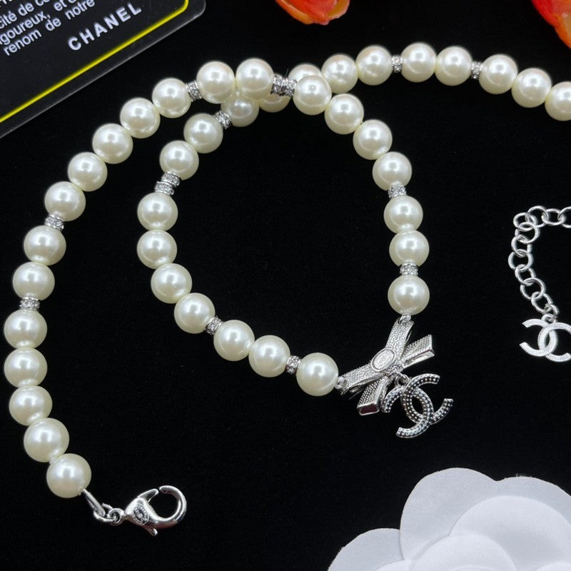 CC Bow Tie Pearls Necklace