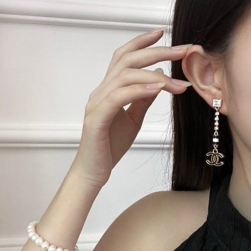 CC 24C Black Gold Tassel Earrings