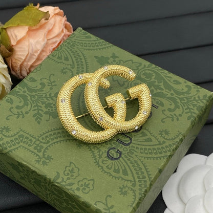GG Diamond Gold Brooch