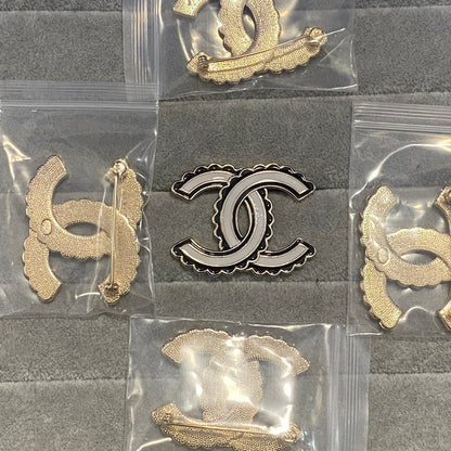 CC Black & White Gold Brooch