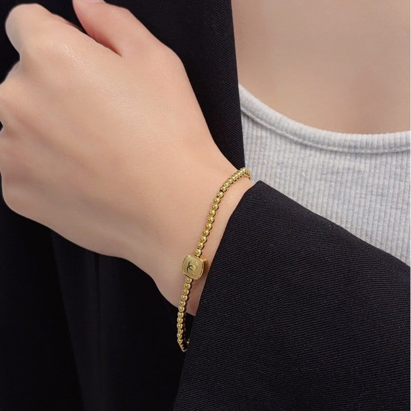 CC Gold Bead Bracelet
