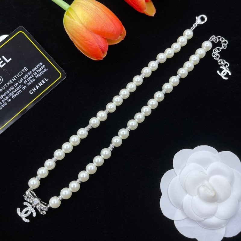 CC Bow Tie Pearls Necklace