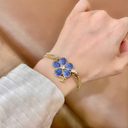 CC Vintage Blue Flower Gold Chain Bracelet