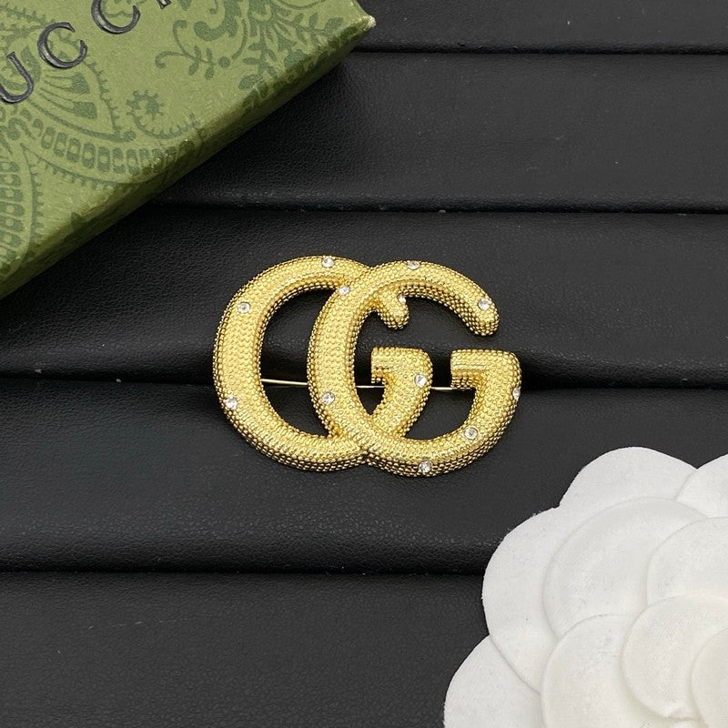 GG Diamond Gold Brooch