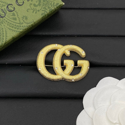 GG Diamond Gold Brooch