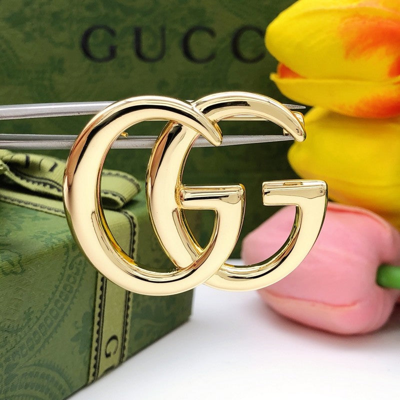 GG Gold Brooch