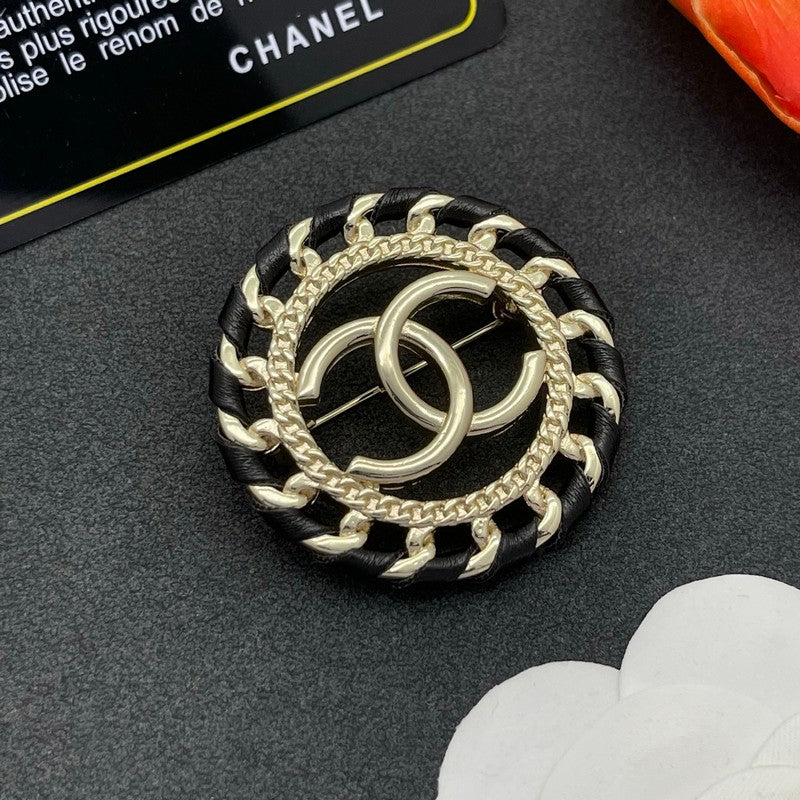 CC Leather Gold Brooch