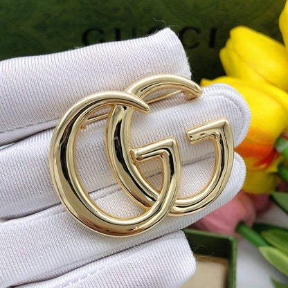 GG Gold Brooch