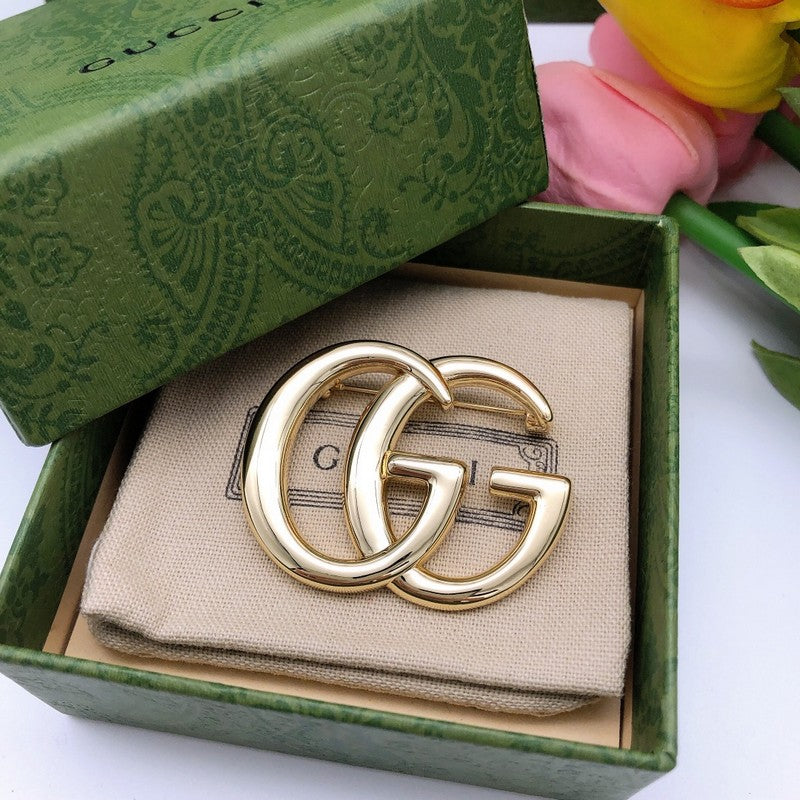 GG Gold Brooch