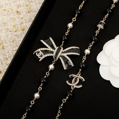 CC 25B Pink & Black Bow Pearl Necklace