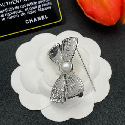 CC Bow Tie Gold Brooch