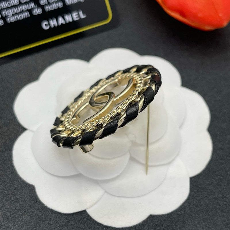 CC Leather Gold Brooch