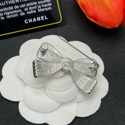 CC Bow Tie Gold Brooch