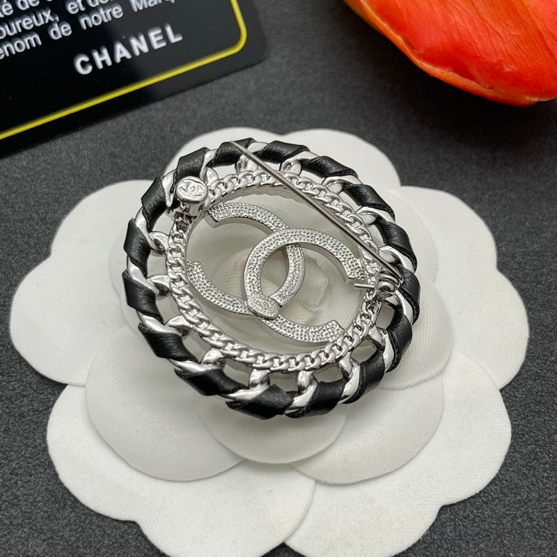 CC Leather Gold Brooch