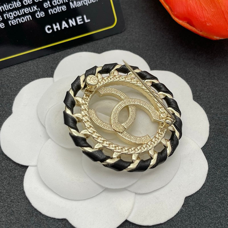 CC Leather Gold Brooch