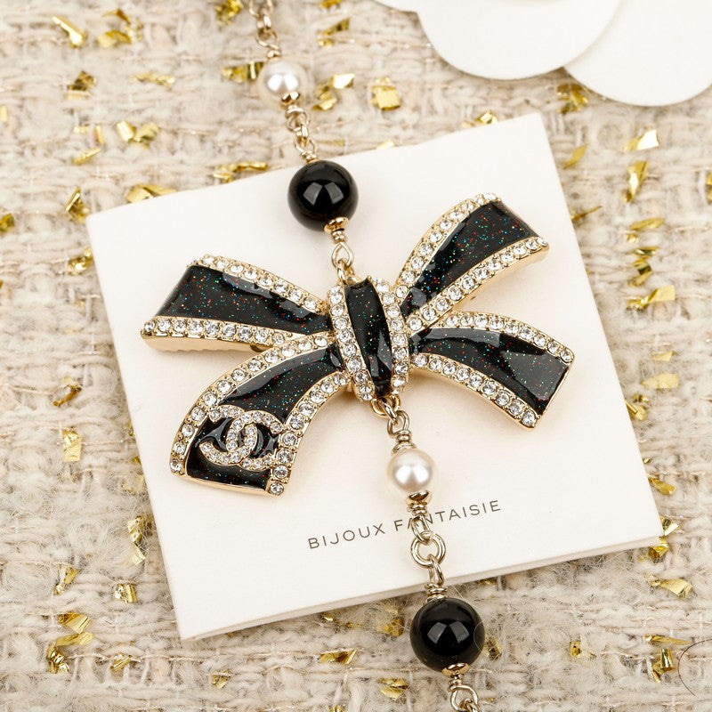 CC 25B Pink & Black Bow Pearl Necklace