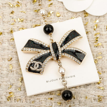 CC 25B Pink & Black Bow Pearl Necklace
