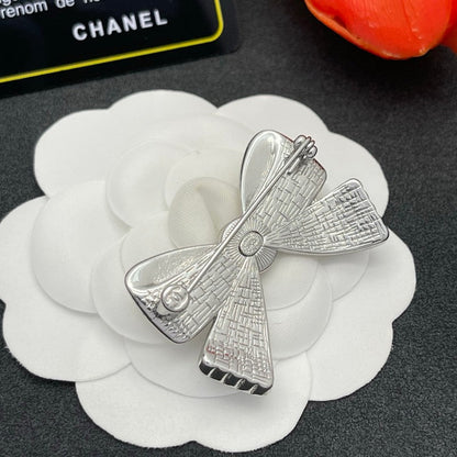 CC Bow Tie Gold Brooch